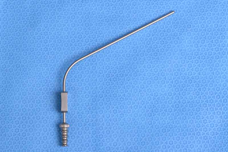 This is a thin instrument used for the removal of fluid or debris from confined surgical spaces. Suction is controlled by a small opening on the handle and there are multiple tip sizes available. The size of the suction tube is indicated by the French measurement scale (three times the diameter in millimeters).  The suction tube also has a thin wire (stylet) that can be placed into the tube to remove tissue that may become trapped during suctioning. The Frazier Suction Tip is used during cases where heme may obscure the surgical field such as during dacryocystorhinostomy or orbital fracture repair.